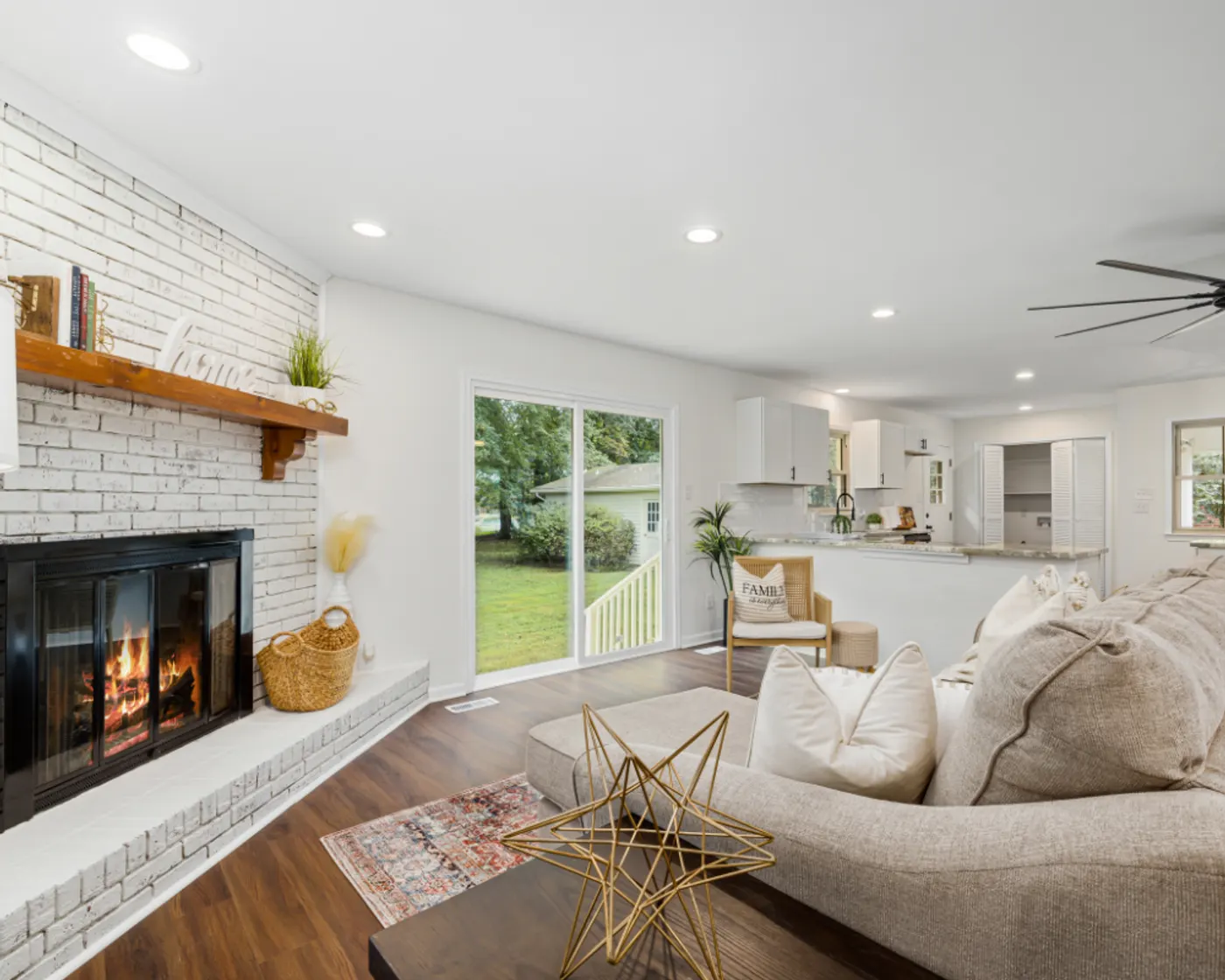 A clean living room with a swept hearth and clear surfaces, illustrating house cleaning services Winder GA